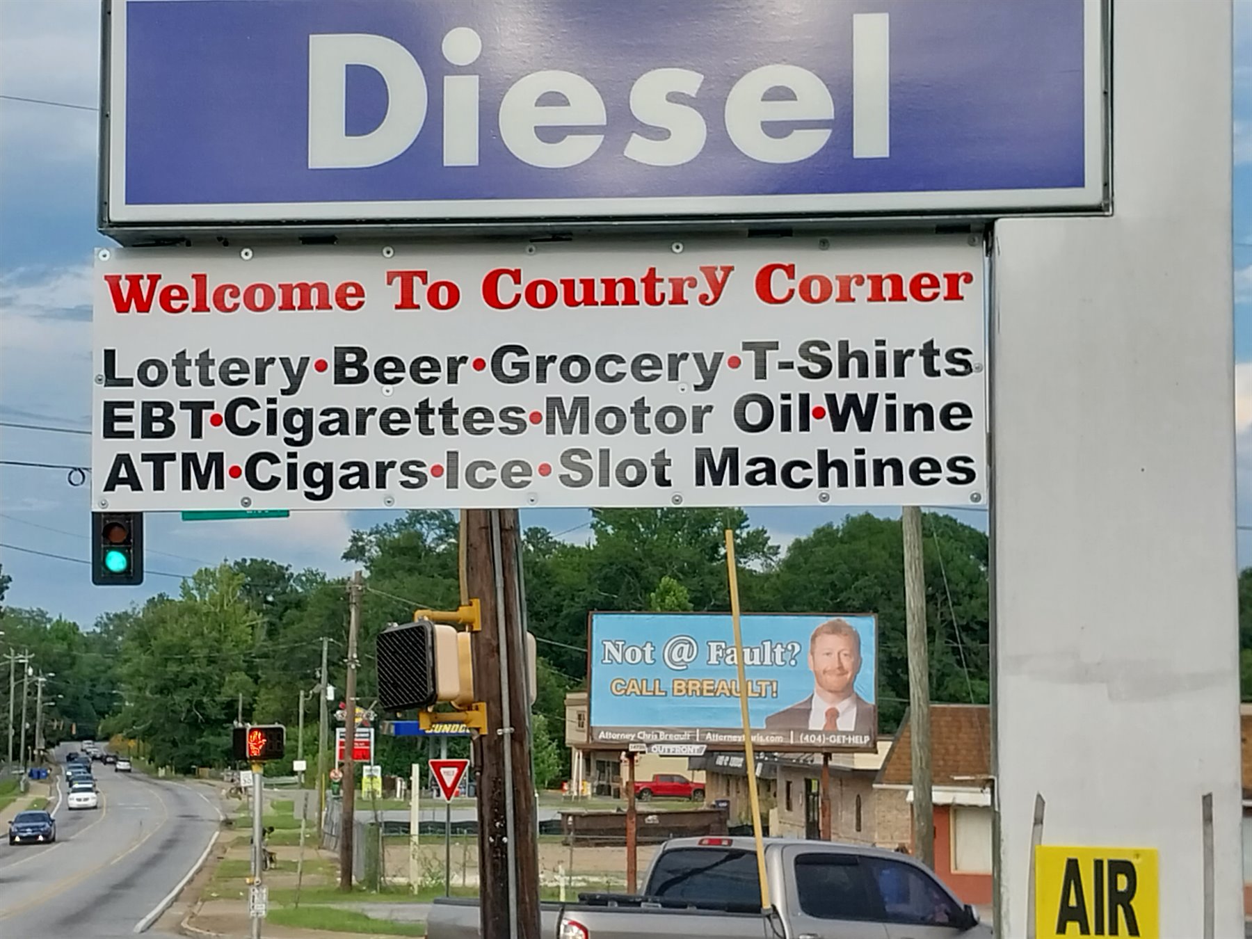 Country Corners exterior diesel and store services sign installed near the roadway